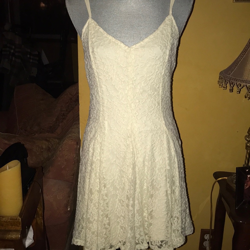 A cream lace dress.